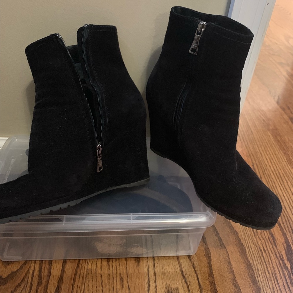 Black suede Prada wedge booties.